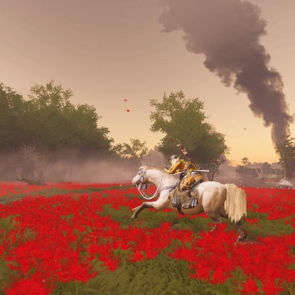 Jin rides a white horse as it gallops through a field full of red flowers, and there is smoke burning in a huge plume up into the sky behind him