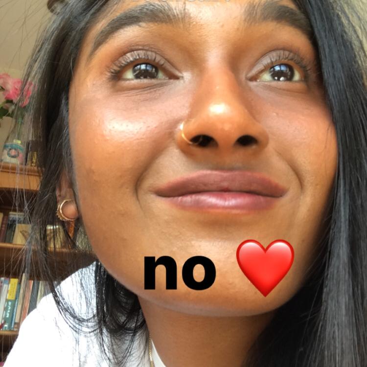 Photo of Zarina with &ldquo;no&rdquo; and a heart emoji typed over it